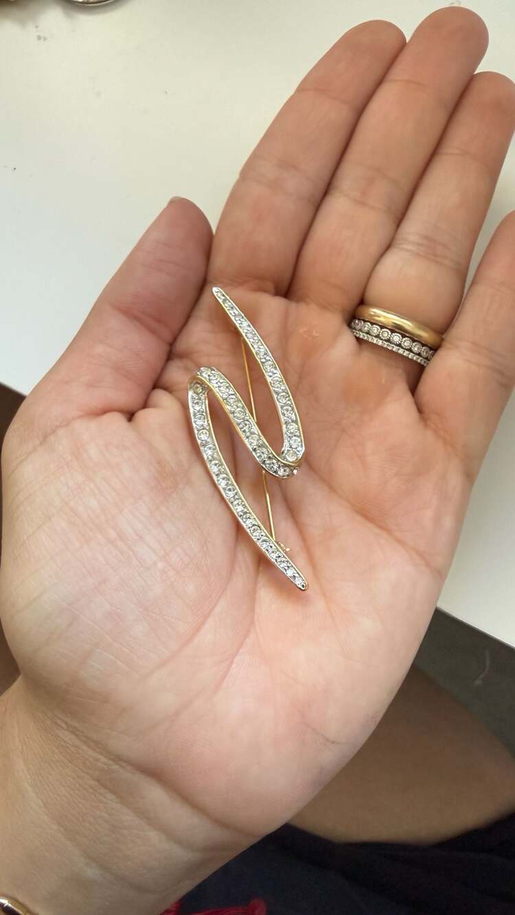 Vintage Monet Gold Tone Rhinestone S-Curve Brooch